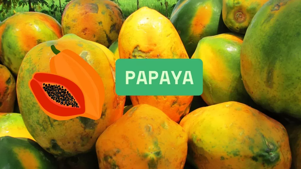 Fresh papaya slices with seeds on a wooden table, highlighting papaya’s natural liver detox and health benefits.